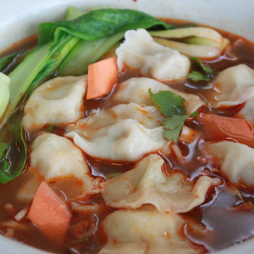 Pork & Cabbage Dumplings in Hot & Spicy Soup